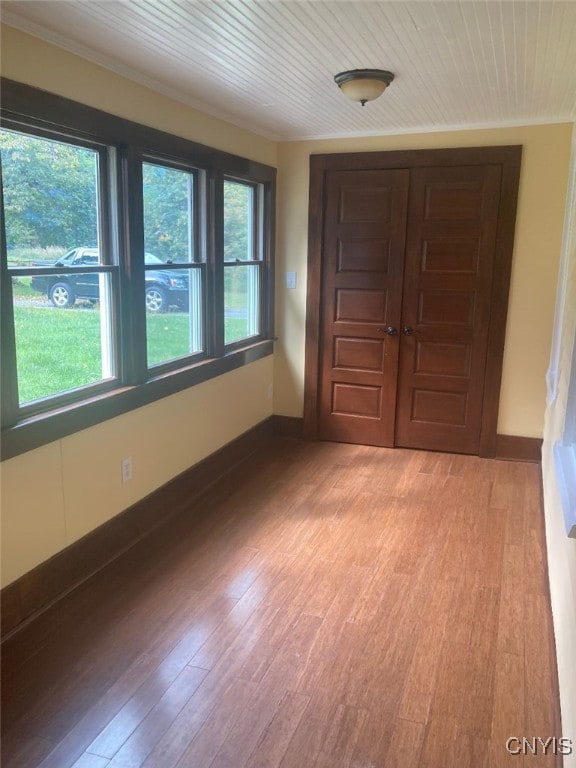 unfurnished room with light hardwood / wood-style floors