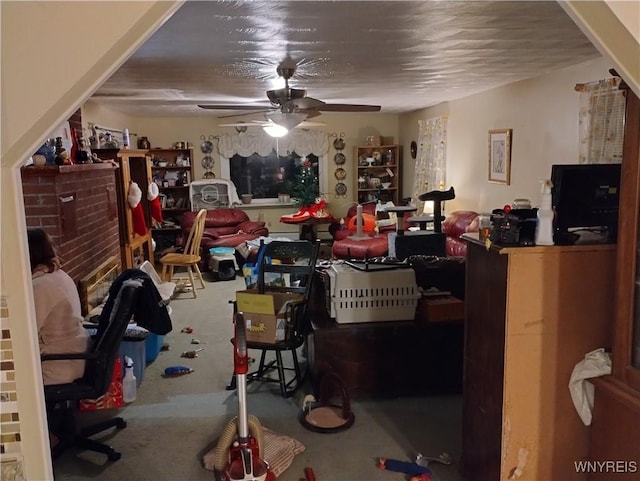 interior space with ceiling fan and carpet flooring