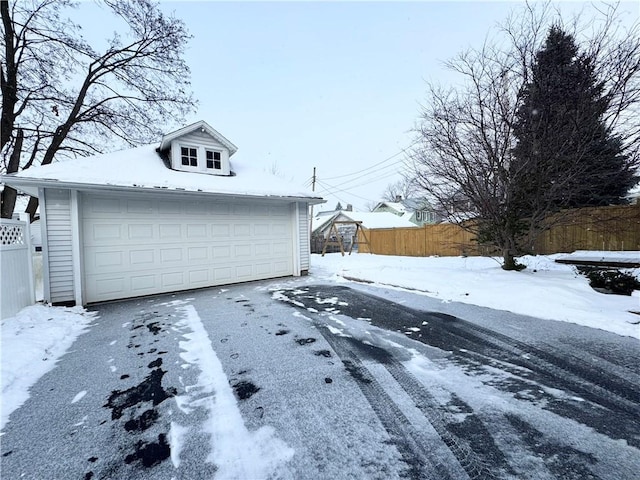 view of snow covered garage