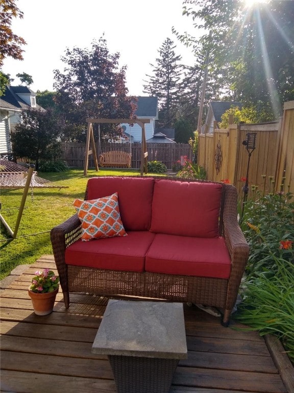 wooden deck with a yard