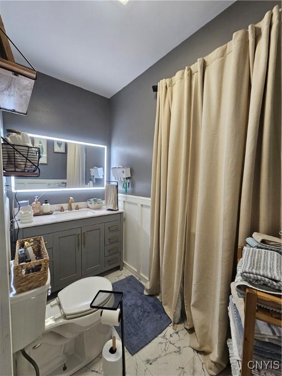 bathroom with vanity and toilet