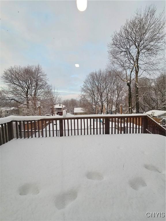 view of snow covered deck