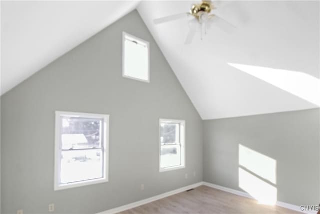 additional living space featuring ceiling fan and light wood-type flooring