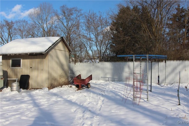 view of yard covered in snow