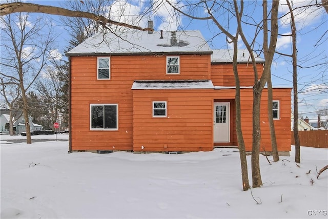 view of snow covered house