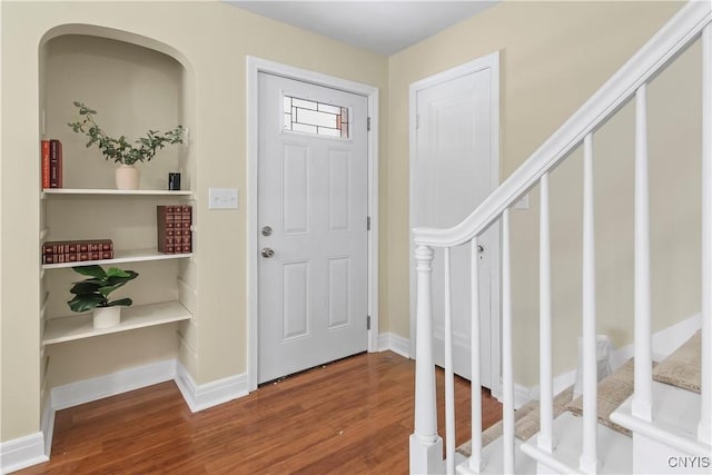 entrance foyer featuring hardwood / wood-style floors