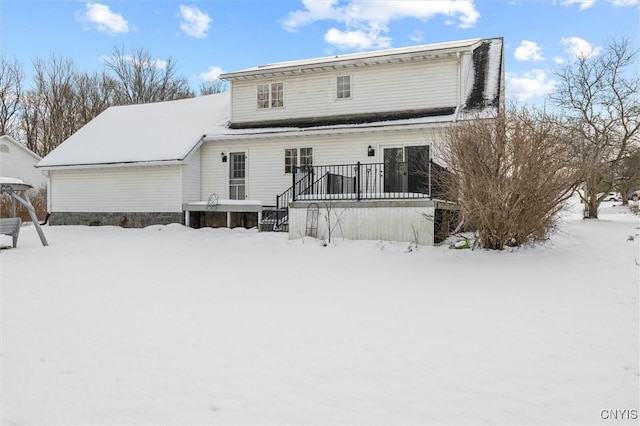 view of snow covered house