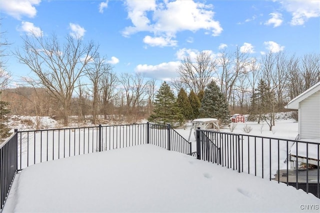 view of yard layered in snow