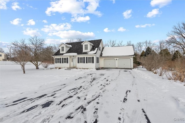 cape cod-style house with a garage