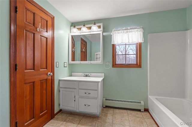 bathroom with vanity, a baseboard radiator, and shower / tub combination