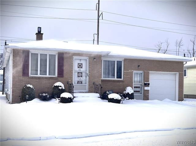 view of front of home featuring a garage