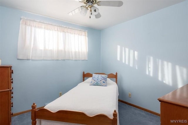 bedroom featuring ceiling fan and carpet flooring