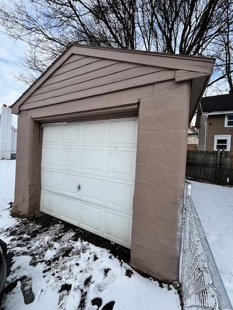 view of snow covered garage