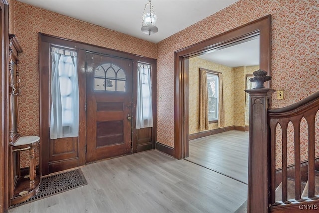 entrance foyer with light wood-type flooring