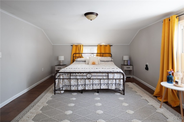 bedroom featuring hardwood / wood-style flooring and lofted ceiling