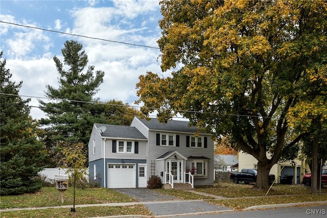 colonial-style house with a garage