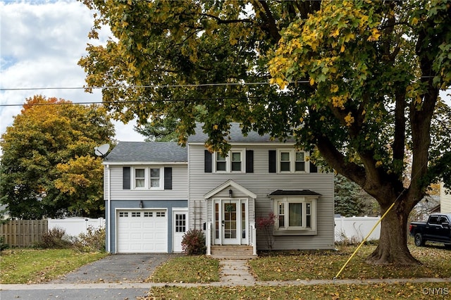 view of front of property featuring a garage