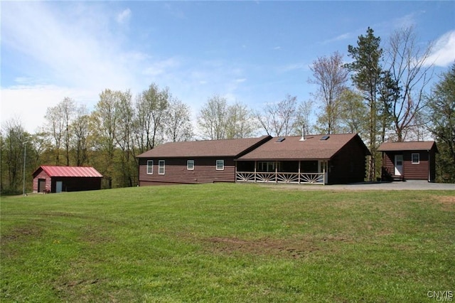 exterior space featuring a shed and a front lawn