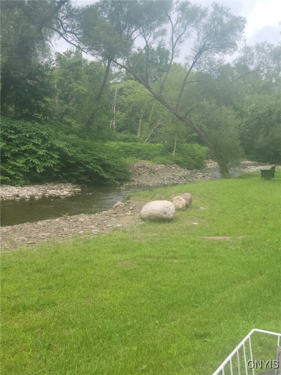 view of yard featuring a water view