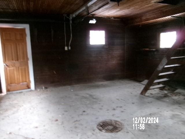 basement featuring wood ceiling