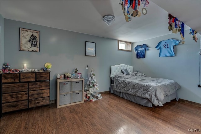 bedroom with wood-type flooring