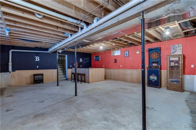 basement with wooden walls