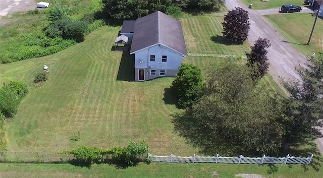 birds eye view of property with a rural view