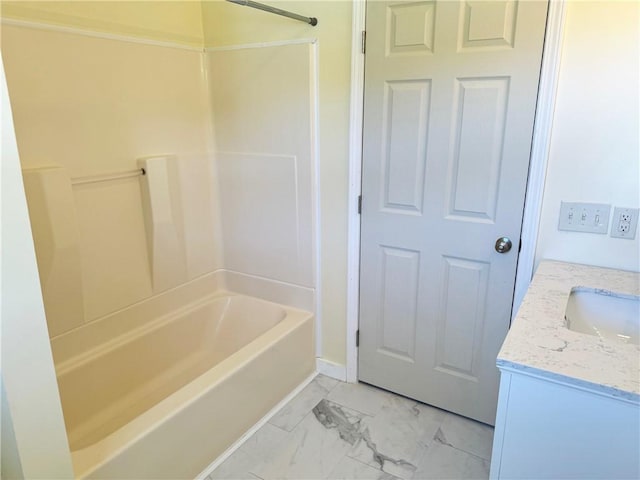 bathroom featuring vanity and bathing tub / shower combination