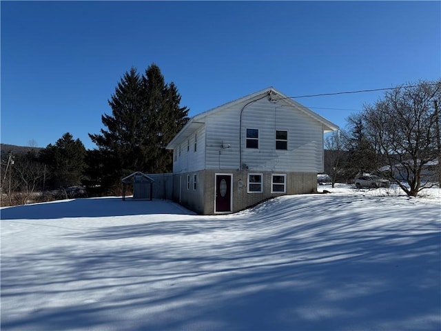 view of snow covered property