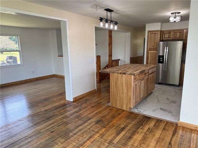 110 Suncrest Terrace Rd, Norwich-Town, NY 13815 - kitchen with stainless steel fridge, a center island, decorative light fixtures, and baseboards