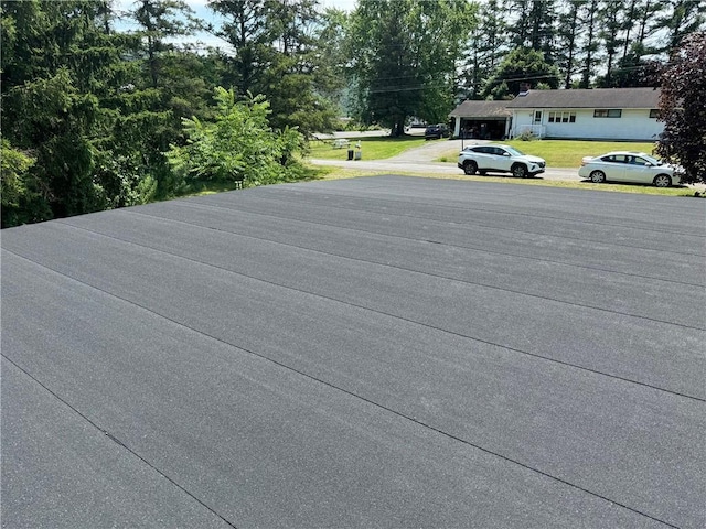 110 Suncrest Terrace Rd, Norwich-Town, NY 13815 - exterior view of a rolled roof and driveway