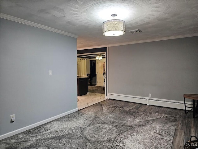 empty room featuring baseboard heating, ceiling fan, crown molding, and hardwood / wood-style floors