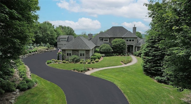 view of front of property with a front lawn