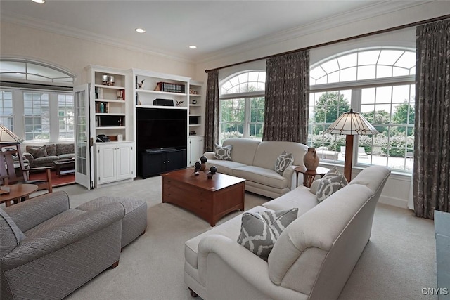 living room with crown molding and light carpet