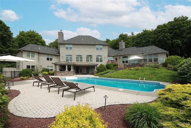 view of pool featuring a patio