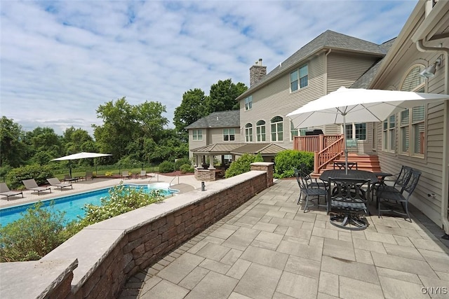 view of patio / terrace with a gazebo and a fenced in pool