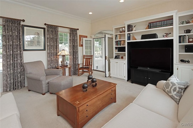 carpeted living room featuring crown molding