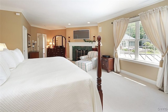 bedroom featuring light carpet, crown molding, and a fireplace