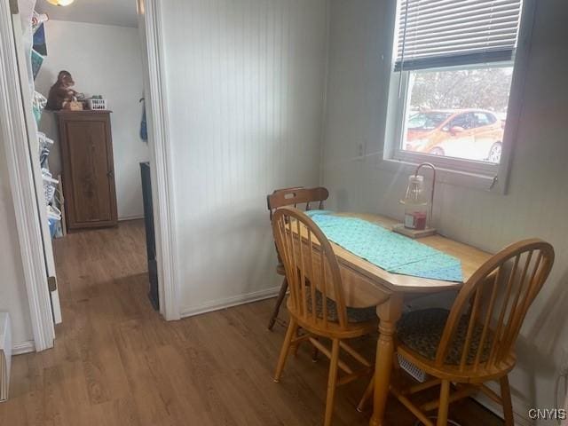 dining space with light wood-type flooring