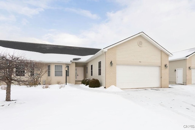 single story home with a garage