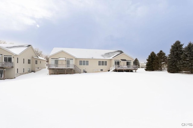 view of front of home with a wooden deck