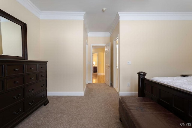 carpeted bedroom with ornamental molding