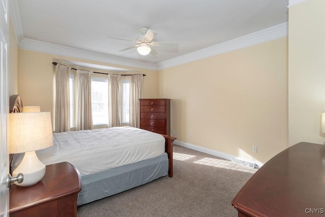 carpeted bedroom featuring crown molding and ceiling fan