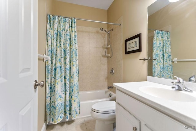 full bathroom featuring tile patterned flooring, vanity, shower / bath combo with shower curtain, and toilet