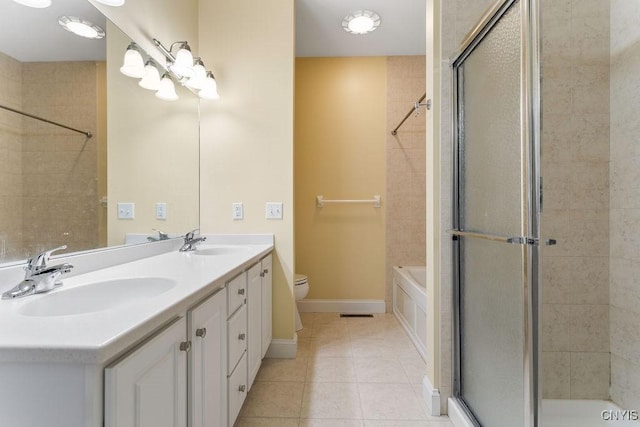 full bathroom with independent shower and bath, vanity, tile patterned flooring, and toilet