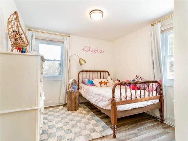 bedroom featuring hardwood / wood-style floors