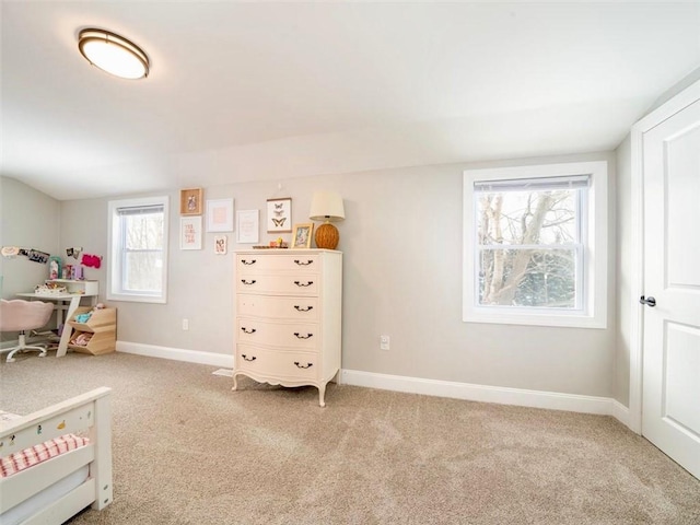 unfurnished bedroom featuring light colored carpet