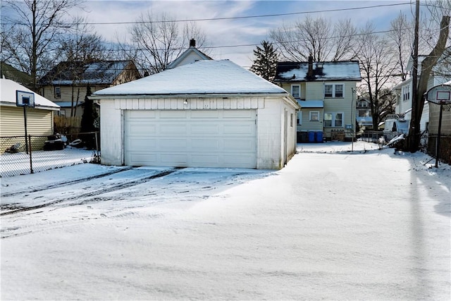 view of snow covered garage