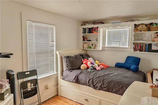 bedroom featuring light hardwood / wood-style floors