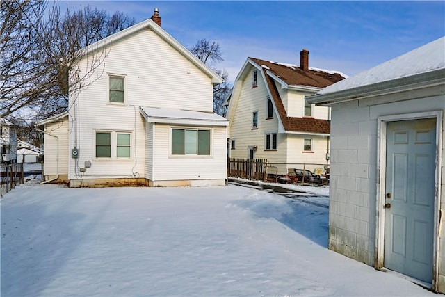 view of snow covered house